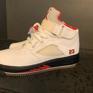 Worn one time sz 5.5 youth (fits women’s 7.5) Nike Jordan sneakers